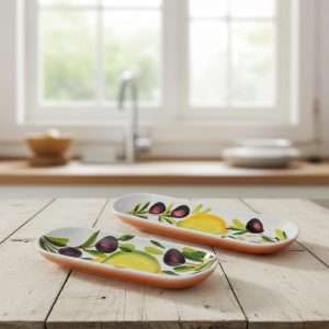 ceramic snack container with lemon and olive design on a white background