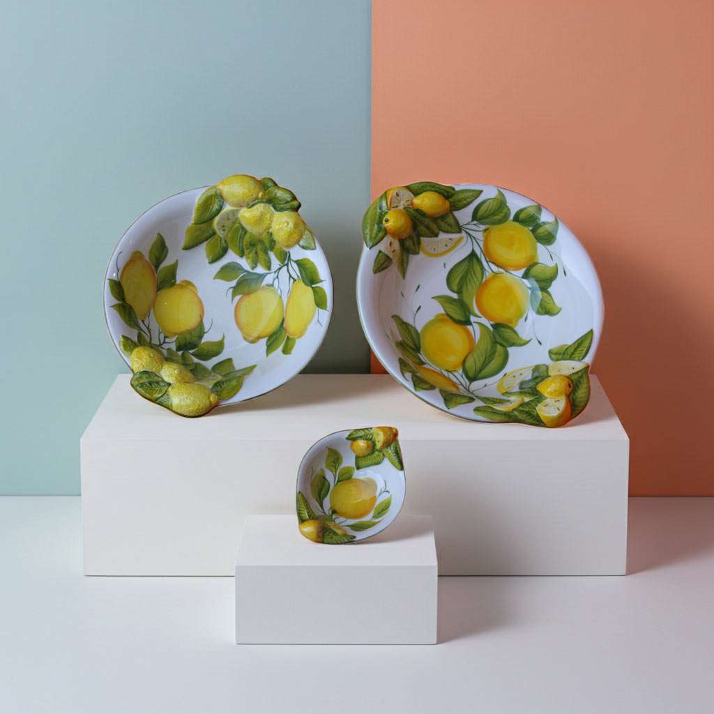 set of bowl, large bowl, and small bowl with lemon and leaf design on a white background