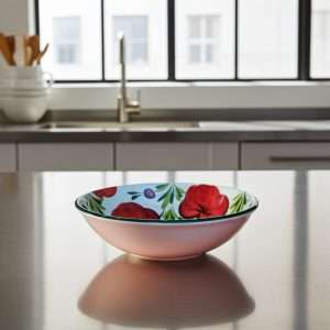 white ceramic bowl with tomato and olive design on a white background