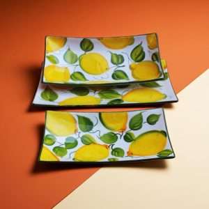 rectangular ceramic tray, in various sizes, with lemon and leaf decoration on a white background