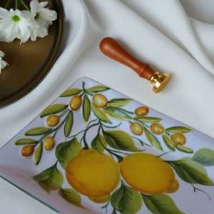details of storage trays with lemon design on a white background