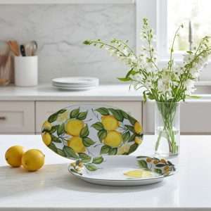 Set of designer trays with lemon and leaf decoration on a white background