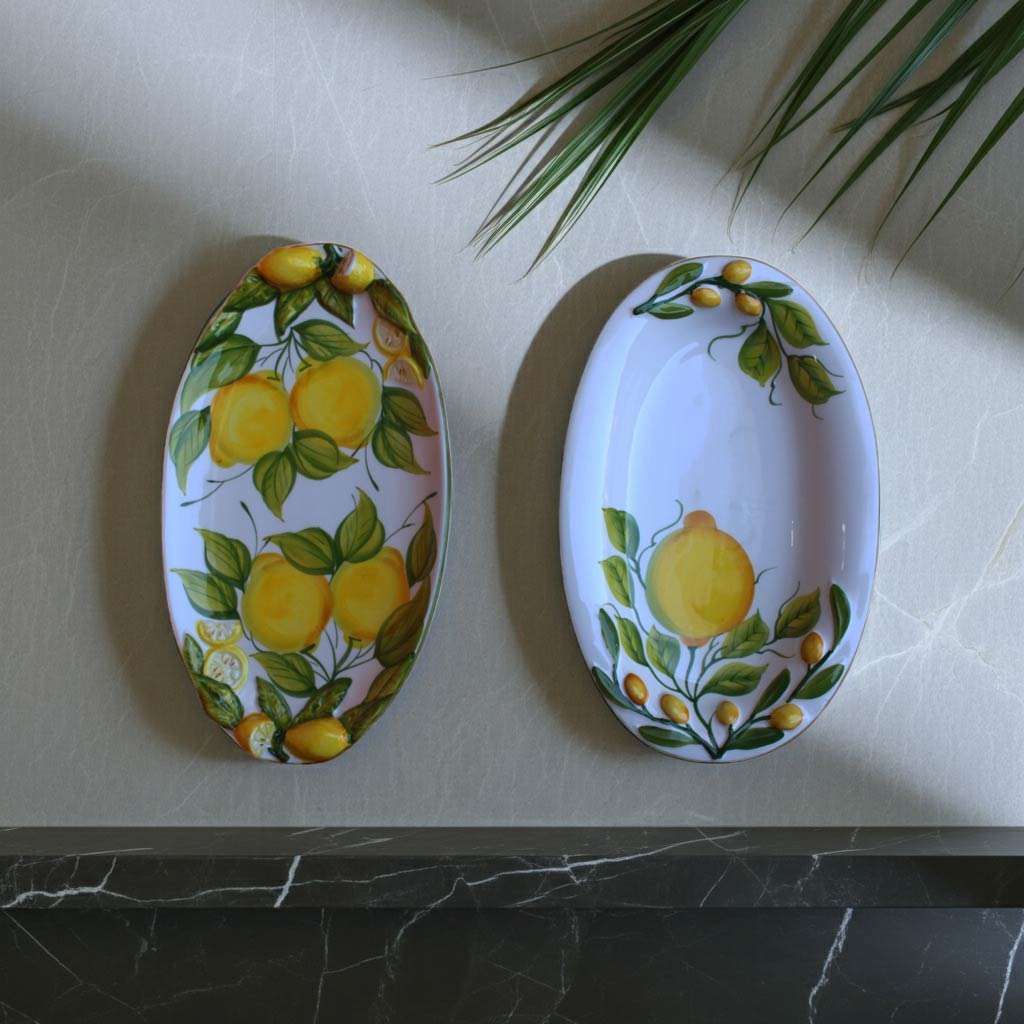 Design Trays with Lemon and Leaf Decoration on a White Background