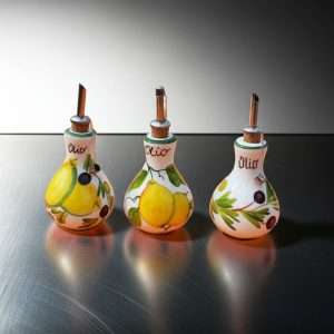 Ceramic Oil Bottle Decorated with Lemon and Olive Motifs on White Background