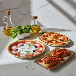 pizza plate, rectangular plate, and oval bruschetta dish decorated with tomato and mozzarella design