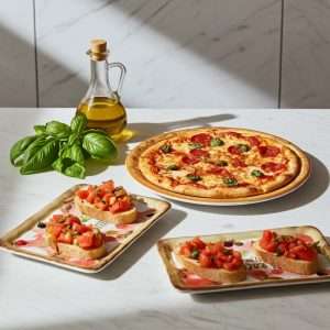 pizza plate, rectangular plate, and oval bruschetta dish decorated with tomato and mozzarella design