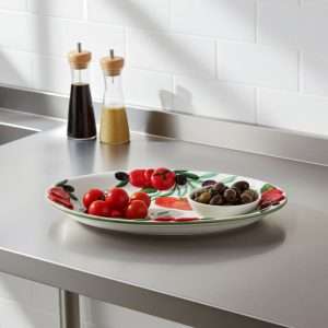 handcrafted ceramic tray, hand-decorated with tomato and olive design on a white background